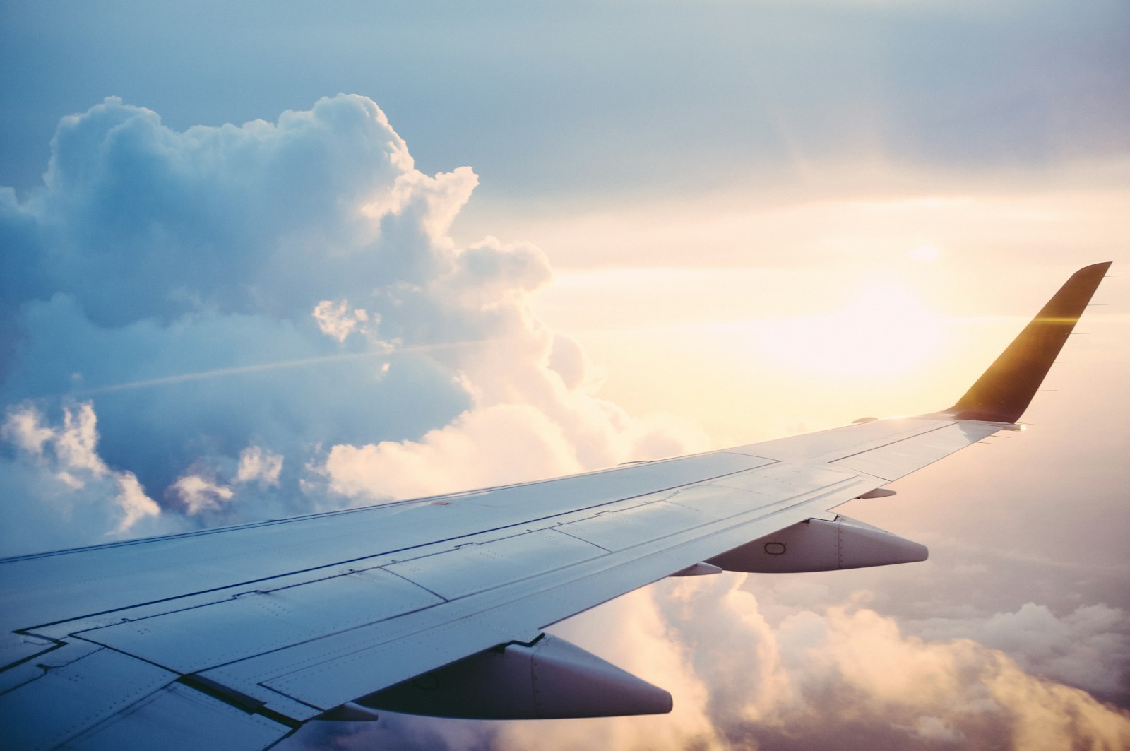 Aircraft in flight, representing global logistics